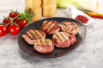Grilled pork tenderloin with bacon