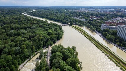 Summer River Isar in Munich Flood View from above. Current and lots of water City and forest Aerial...