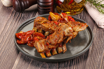 Baked lamb ribs with vegetables