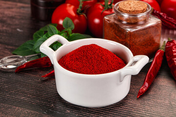 Spicy dry paprika powder in the bowl