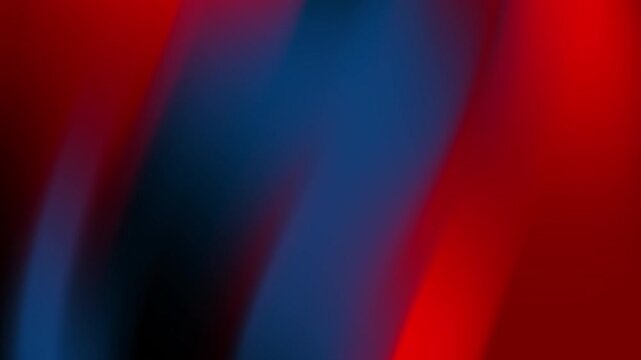 Abstract image featuring smooth gradients of red and blue hues, creating a dynamic visual flow.