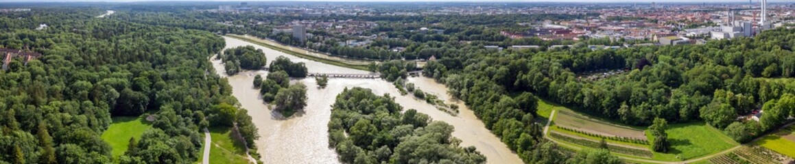 Summer River Isar in Munich Flood Panoramic View from above. Current and lots of water City and...