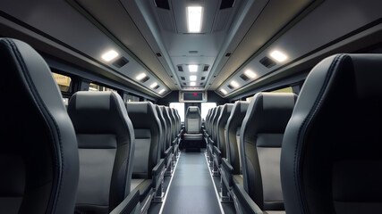 Modern bus interior with clean, organized seating, individual air vents, and dark-tinted windows. Generative AI