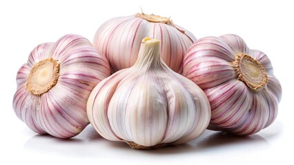 Fresh, raw garlic cloves, isolated on a white background, are a healthy, organic ingredient for cooking and a flavorful addition to any dish