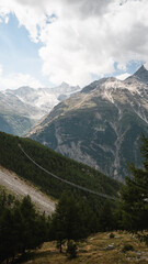 Suspension bridge with breathtaking views of the Swiss Alps