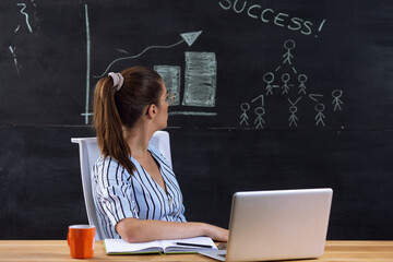 Young woman presenting business plan