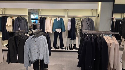 A chic retail display featuring contemporary fashion and minimalist design.