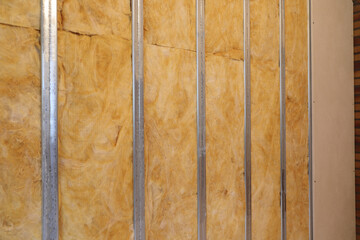 a new drywall with insulation and metal studs