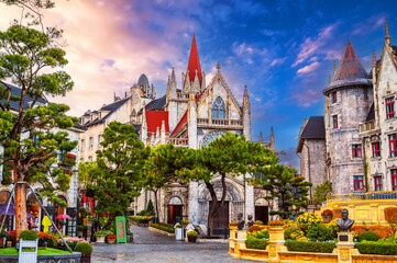 Catholic church on the square in the French village in Ba Na Hills Park in Da Nang in Vietnam at...