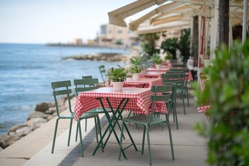 A selective focus photograph of a cafe table on the Mediterranean sea embankment
