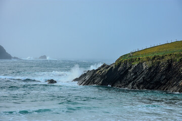 waves crashing on rocks
