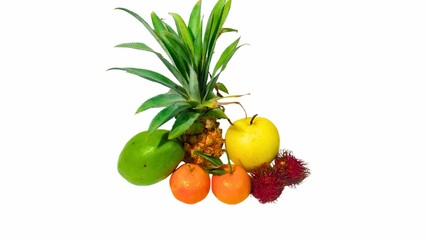 Colorful Tropical Fruit Arrangement Against a White Background