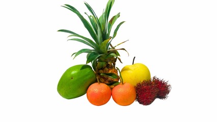 Colorful Tropical Fruit Arrangement Against a White Background