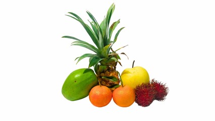 Colorful Tropical Fruit Arrangement Against a White Background