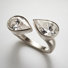 Elegant pear-cut diamond ring with dual stones and platinum band