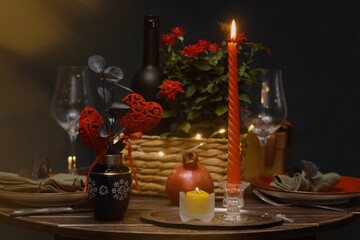 Valentines day celebration or romantic date concept. Table set for candlelit dinner for two.