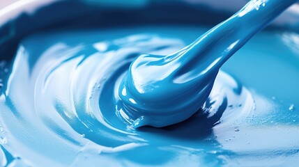 Industrial-grade silicone adhesive for versatile applications with a smooth, vibrant blue texture and easy mixing properties.