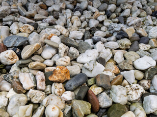 Diverse Collection of Smooth River Stones and Pebbles
