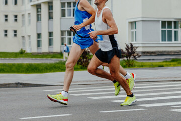 blind runner with his guide running city marathon