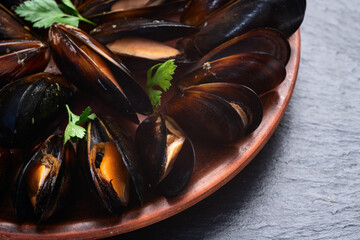 Mussels with parsley on a plate photography
