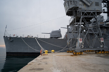 Nose of British warship with gun cannon moored to the coast in Thessaloniki. Conflict. Weapon....