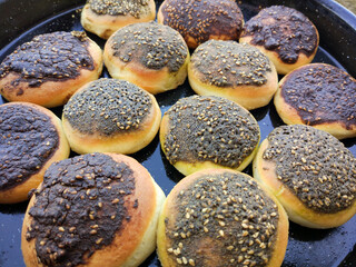 traditional Palestinian of Manakish Zaatar, Manaqish, manaeesh, manakeesh, manooshe, man'ousheh, mankousheh, topped with Sesame , thyme, cheese.
