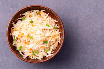 Tasty marinated cabbage with carrot, healthy food  Sauerkraut photography . Top view