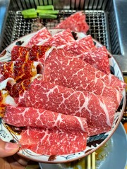 Close up sliced Wagyu beef steak prepared for Yakiniku (Japanese barbecue)