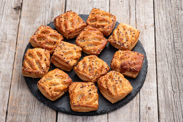 Homemade mini puff pastries with meat photography . Top view