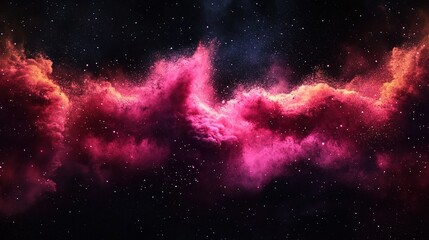 Fototapeta premium A pink and red cloud of powder in space on black background