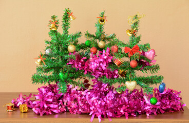 Small Christmas Tree with Decorative line and Gift Boxes on Table