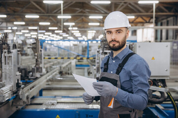 Supervisor controlling aluminum and PVC windows and doors production line