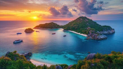 Tropical island sunset with boats and beach.