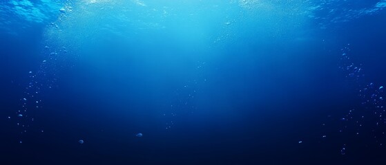 Underwater scene with bubbles and blue tones, evoking a sense of calm and depth.