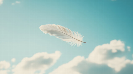 single white feather gracefully floats in clear blue sky with soft clouds, evoking sense of peace and freedom