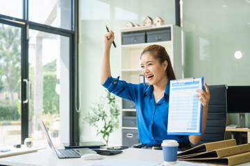 A young businesswoman  financial advisor, skilled in stock market loans, entrepreneurship, and...
