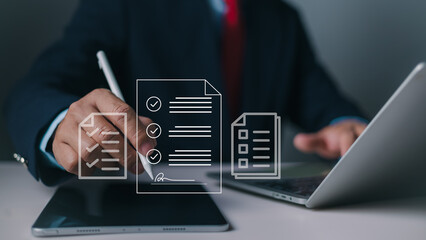 Document management man signs an electronic document on digital document by virtual notebook screen using a stylus pen, E-Document management Paperless workplace, E-signing, Electronic signature.