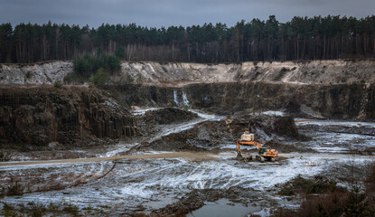 Work of equipment on the basalt quarry.
