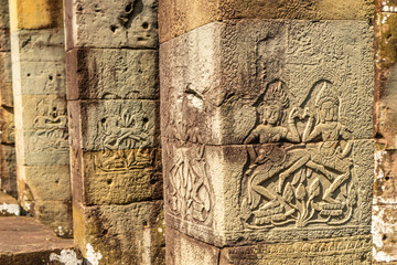 Ancient hindu Banteay Kdei khmer  ruined temple columns decorated with dancing figures , Angkor Archaeological Park, Siem Reap, Cambodia