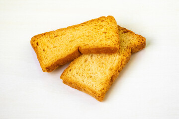 Crispy and tasty toast or rusk, isolated on a white background.