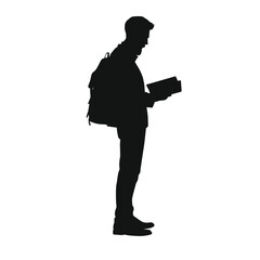 Silhouette of a person reading a book