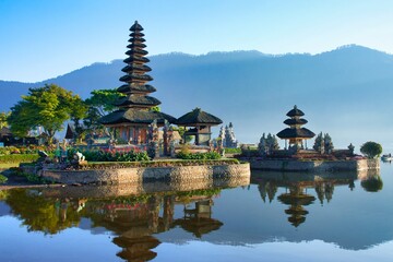 Morning view of Ulun Danu Beratan Temple on the lake. The most iconic and famous temple in Bali surrounded by mountains