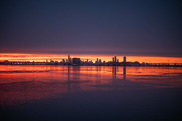 Stunning manhatta NYC skyline during sunrise winter season, far away skyline taken from New Jersy side, copy space travel world famous destination