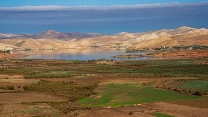 Serene Lake and Arid Mountains