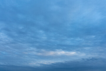 Serene Blue Sky with Soft Cloudscape Nature Background