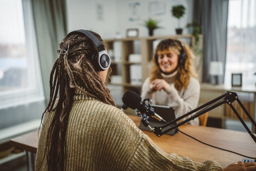 adult woman presenter interview female guest and stream audio podcast