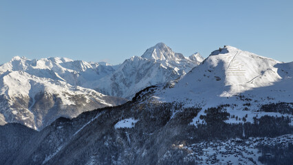 The snow-covered Valais Alps from the Vercorin ski resort. Peaks in the backgound