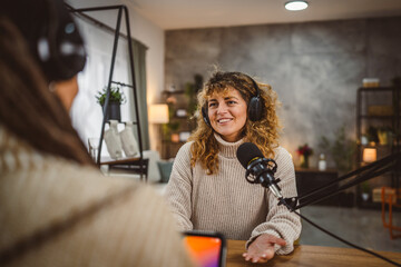adult woman presenter interview female guest and stream audio podcast