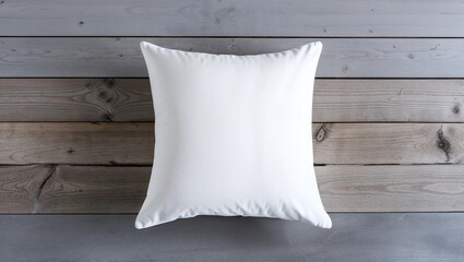 Flat lay mockup of white square cushion on a grey wooden background 