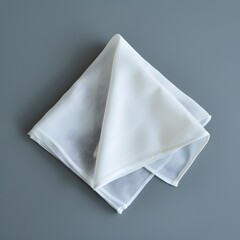 Elegant White Silk Fabric with Soft Drapery on Gray Background